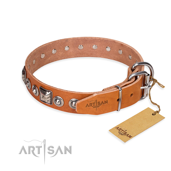 Genuine leather dog collar made of soft to touch material with corrosion proof decorations